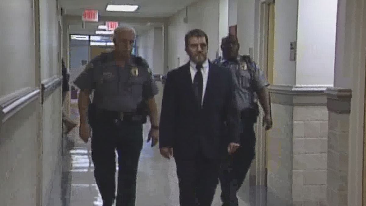 Convicted murderer Billy Ray Marchman is escorted from a Houston County courtroom in this 2005 WTVY file photo.