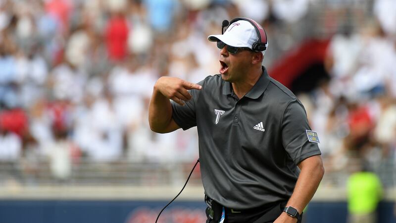 Troy head coach Jon Sumrall reacts during the first half an NCAA college football game against...