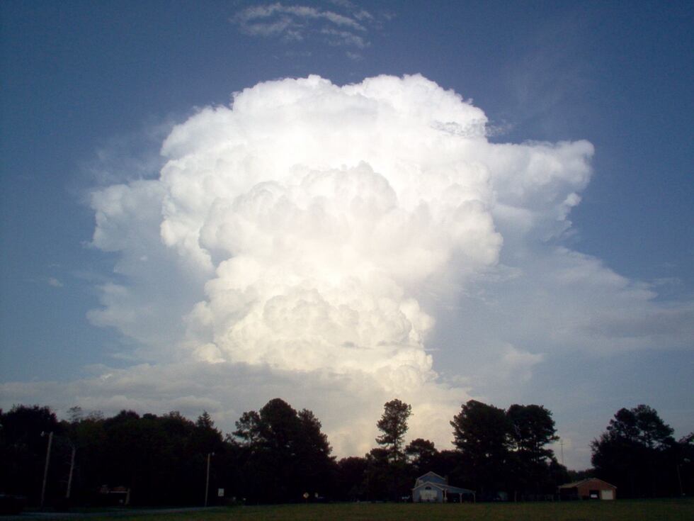 Warm air parcels rise into the cool atmosphere where the moisture inside of them condense to...