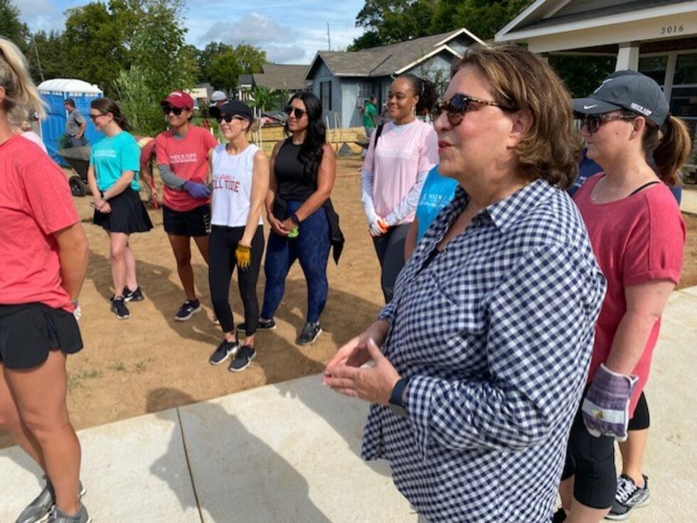 Terry Saban and the wives of other Alabama football coaches spent Wednesday helping landscape...