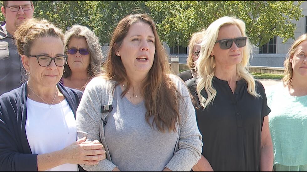 Family friend Dena Leuchi and other friends and family of slain Enterprise school teacher Sara...