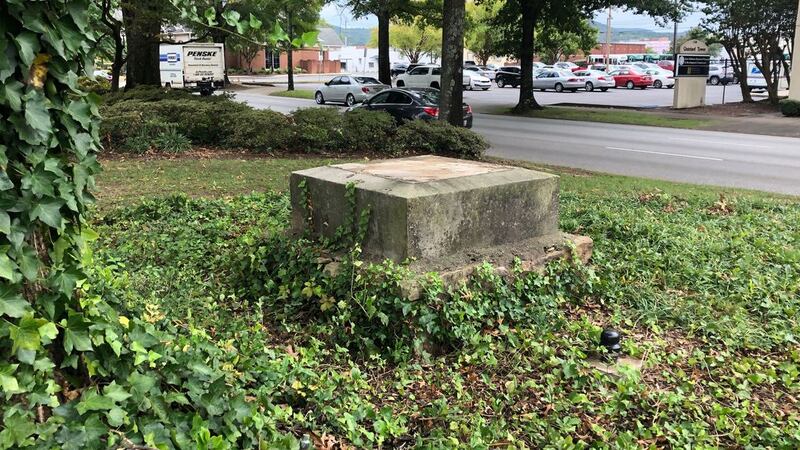 Workers with the city of Anniston removed the stone obelisk from the grassy median of a busy...