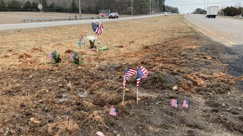 Flowers and flags were placed near the site of the Blackhawk helicopter crash.