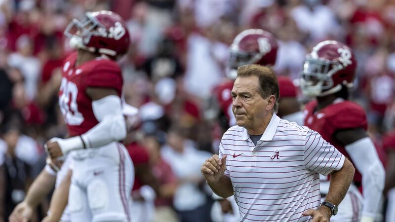 Alabama head coach Nick Saban takes to the field during warmups before an NCAA college...