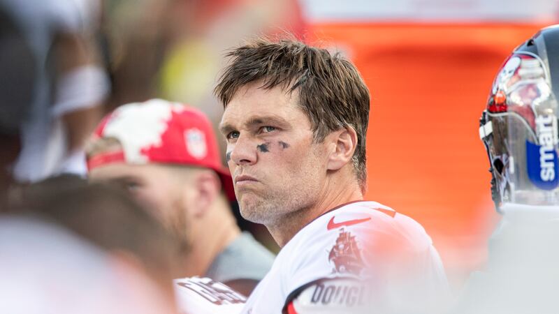 Tampa Bay Buccaneers quarterback Tom Brady (12) scowls on the bench after an offensive...