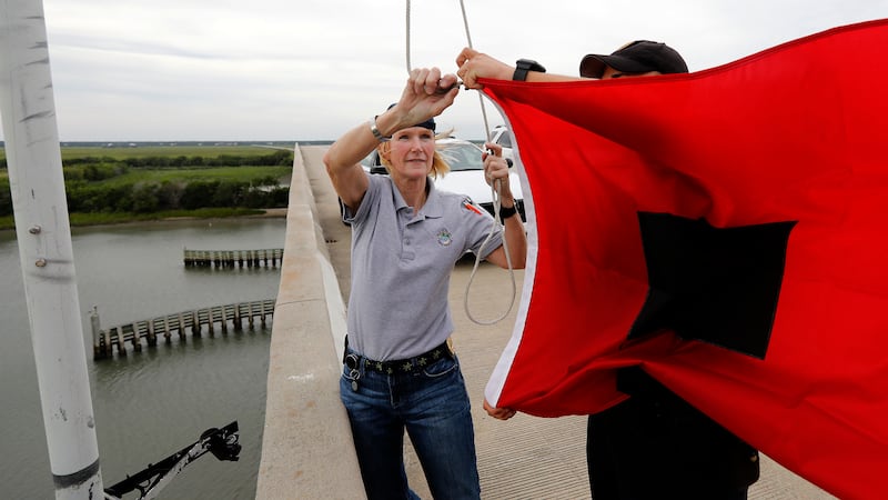 Isle of Palms Fire Chief Ann Graham, at left, and Isle of Palms police officer Thomas Molino...
