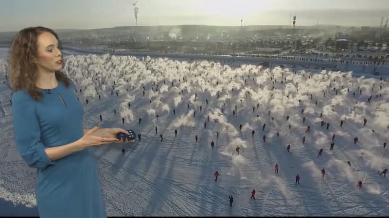 Over 1,000 local residents and visitors played a "turning-water-into-ice"...
