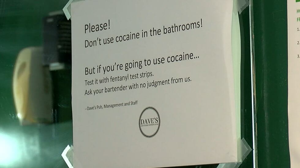 Sign posted in restroom at Dave's Pub