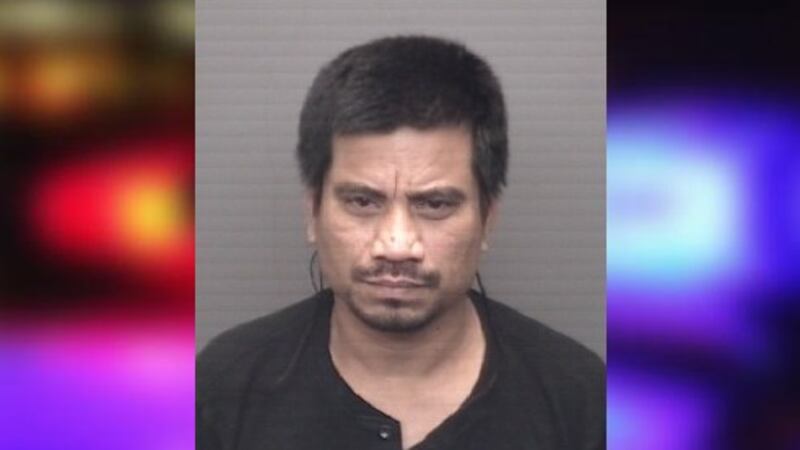 FILE - Police say a dad crashed while driving drunk with his children in the car.