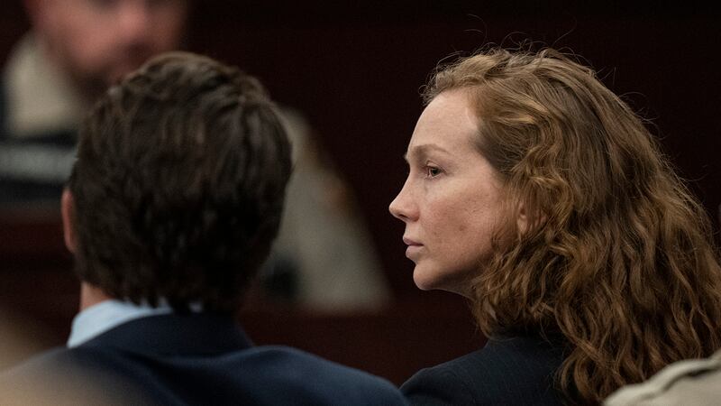 Kaitlin Armstrong sits with her defense lawyers during her murder trial at the...