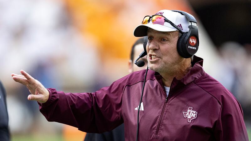 Texas A&M head coach Jimbo Fisher yells to his players during the second half of an NCAA...